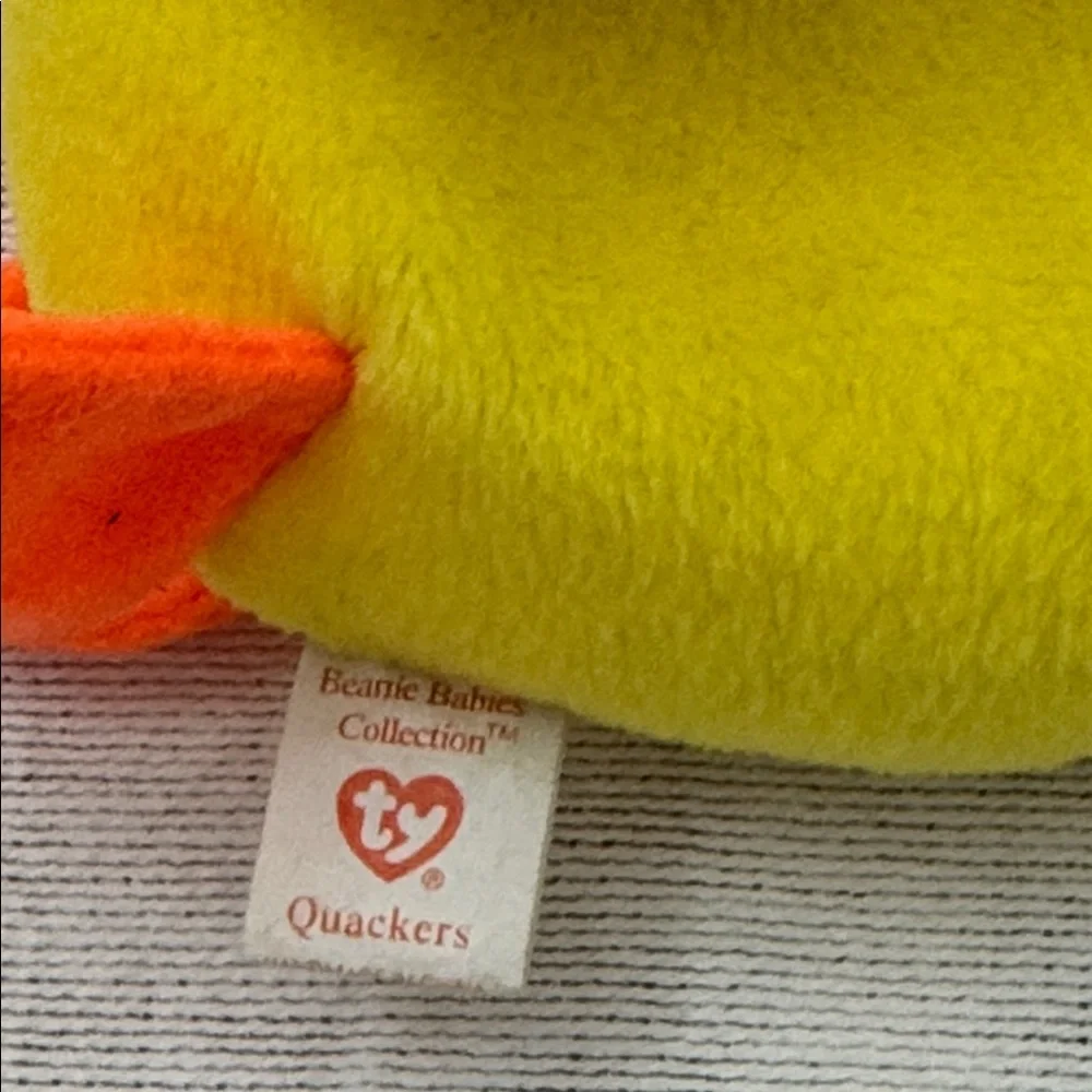Ty Beanie Babies Yellow 1993 Quackers and 1996 Brown Jolly walrus Plush. (Mlb)